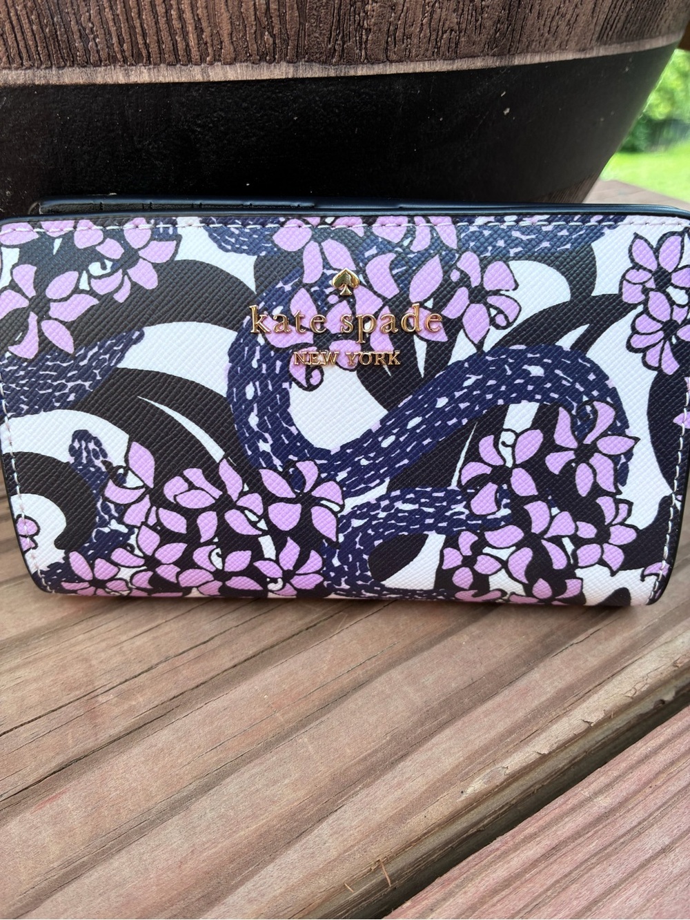 kate spade snake garden bifold wallet in navy, black & pink